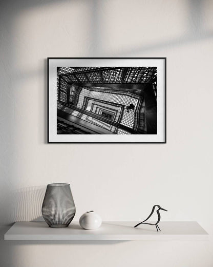 Endless ascent by Marc Estruch: black frame with white mat, 40 x 60 cm, on a wall